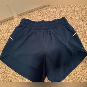 Women’s All In Motion green/blue athletic shorts | Size M